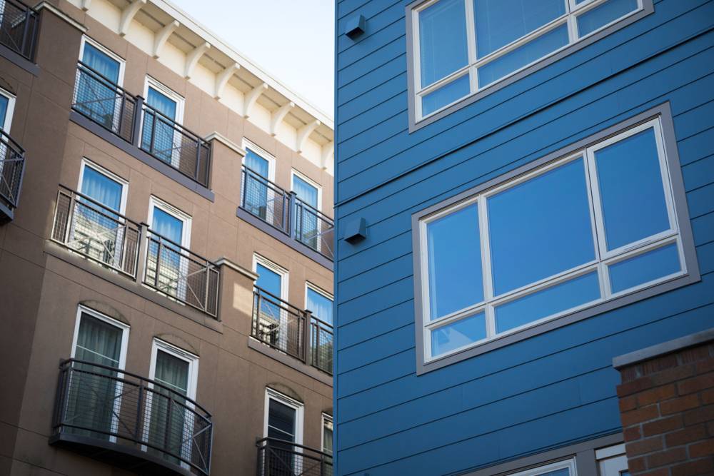 An apartment complex showing two types of siding