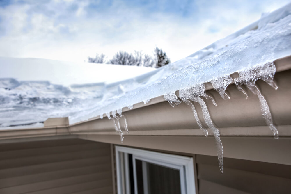 Frozen gutter on a roof.