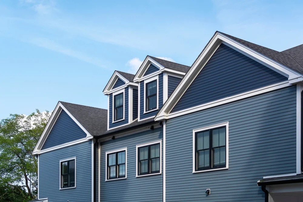 A room with rich blue siding