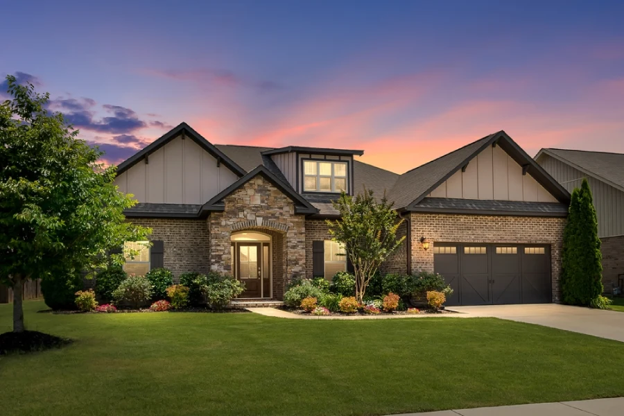 A home with brick siding at sunset